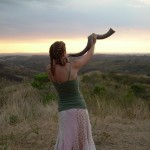 woman blowing shofar